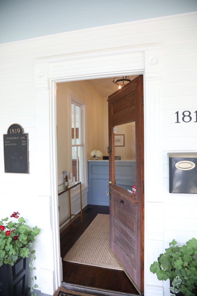 The front door of Dilworth Facial Plastic Surgery, complete with a historic plaque