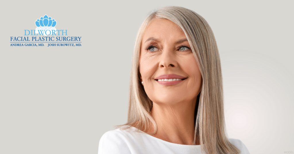 Woman smiling after upper blepharoplasty. (Model)