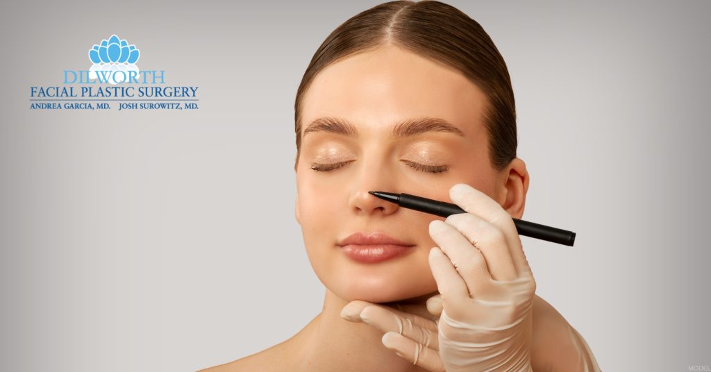 Woman being examined by a plastic surgeon for a rhinoplasty (model) Dilworth Facial Plastic Surgery Logo